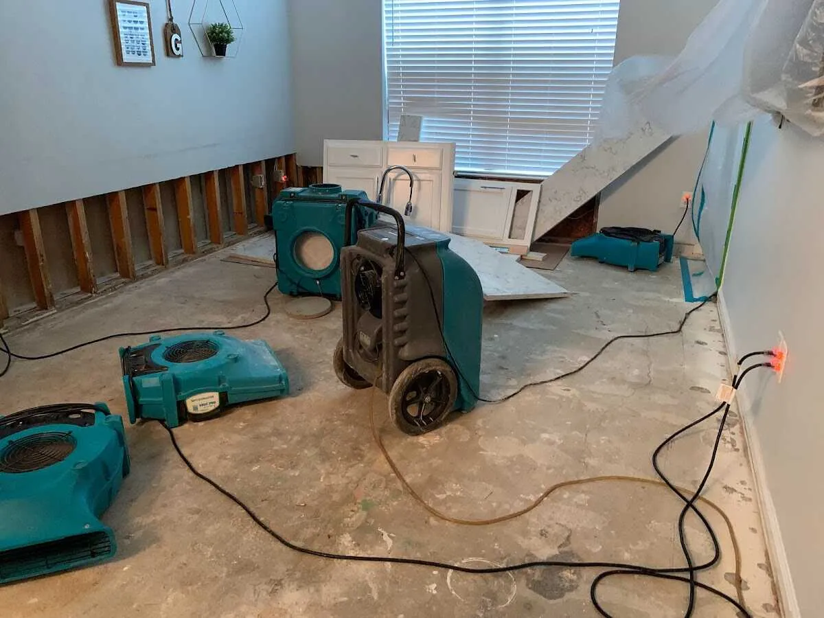 Dehumidifier in flood-cut room for Water Extraction & Removal in Colby